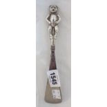 A double sided hallmarked silver topped teddy bear pattern shoe horn