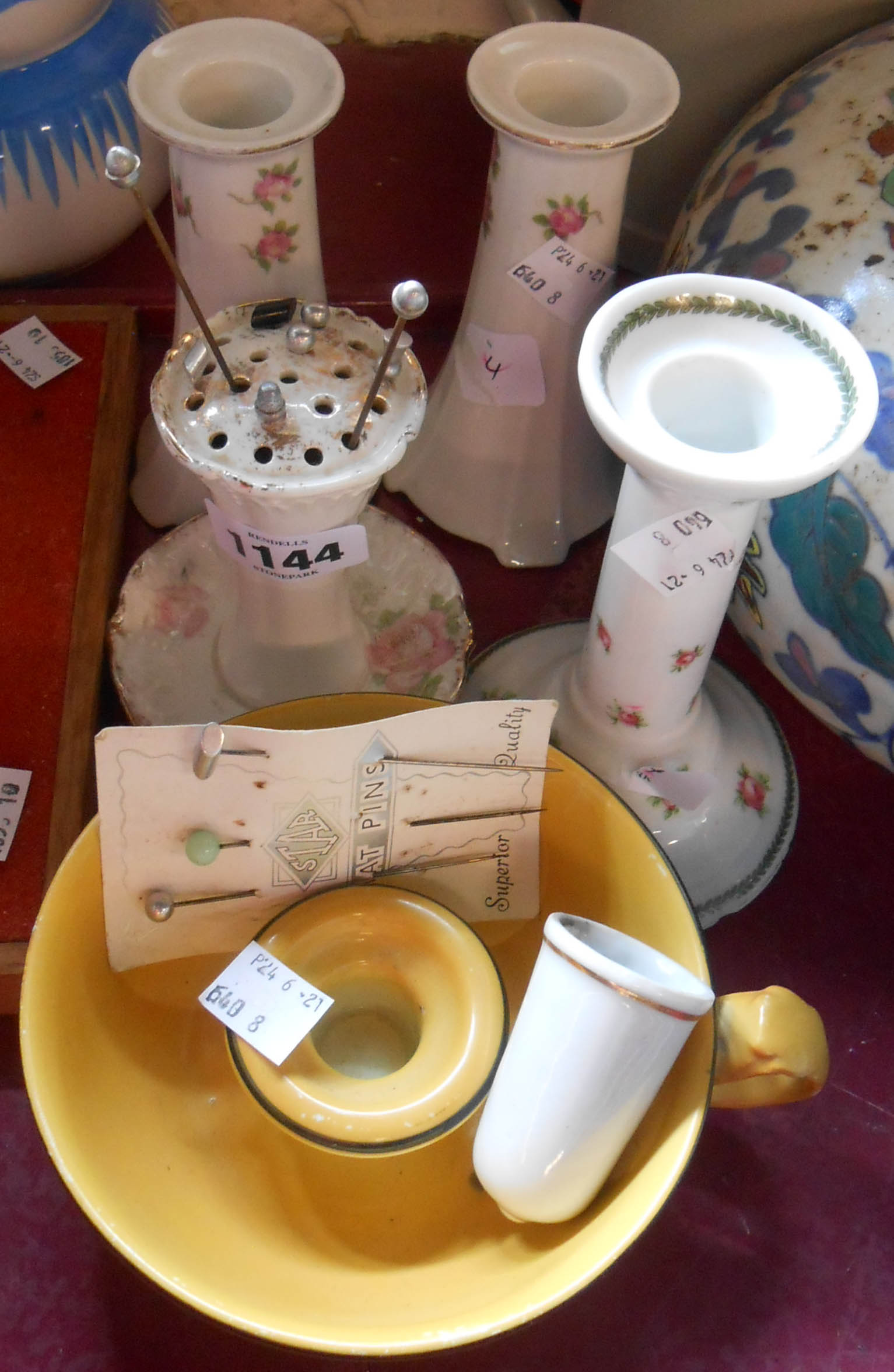 A small selection of china including dressing table candlesticks, hat pin holder, etc.