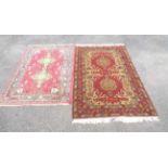 Two hand made Middle Eastern rugs of typical design