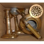 A box containing a pair of 19th Century candlesticks, brass kettle, etc.