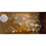 A box containing assorted glassware including Edwardian carafes, vintage Disney tumblers, etc.