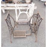 Two cast iron Singer sewing machine treadle bases