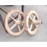 A pair of old barrow wheels