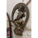 A reproduction resin Art Nouveau style wall mirror with female figure decoration