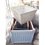 A wooden square form garden planter - sold with a quantity of other garden planters