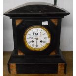 A late Victorian black slate and marble cased mantel clock with decorative gilt bezel and French