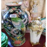 A 20th Century Chinese black ground polychrome bird decorated baluster vase - a/f and drilled - sold