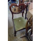 A set of six Victorian mahogany framed balloon back dining chairs with upholstered drop-in seats,