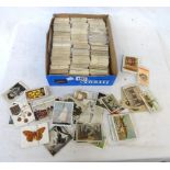A box containing a large collection of seat and parts sets of cigarette cards including W.D & H.O.