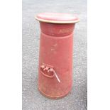 An antique cast iron Ambrosia Ltd milk churn and lid with later painted finish