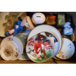 A box containing assorted ceramic and other items including novelty money boxes, collectors' plates,