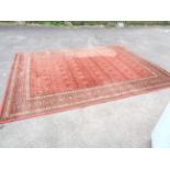 A large Royal Keshan machine made Belgian rug of typical Middle Eastern design