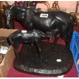 A vintage USSR cast metal figurine of a horse and foal - dated to base 1968