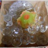 A box containing assorted glassware including drinking glasses, glass dish, etc.