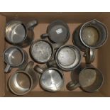 A box containing a quantity of assorted pewter tankards including Whitbread Advertising example,