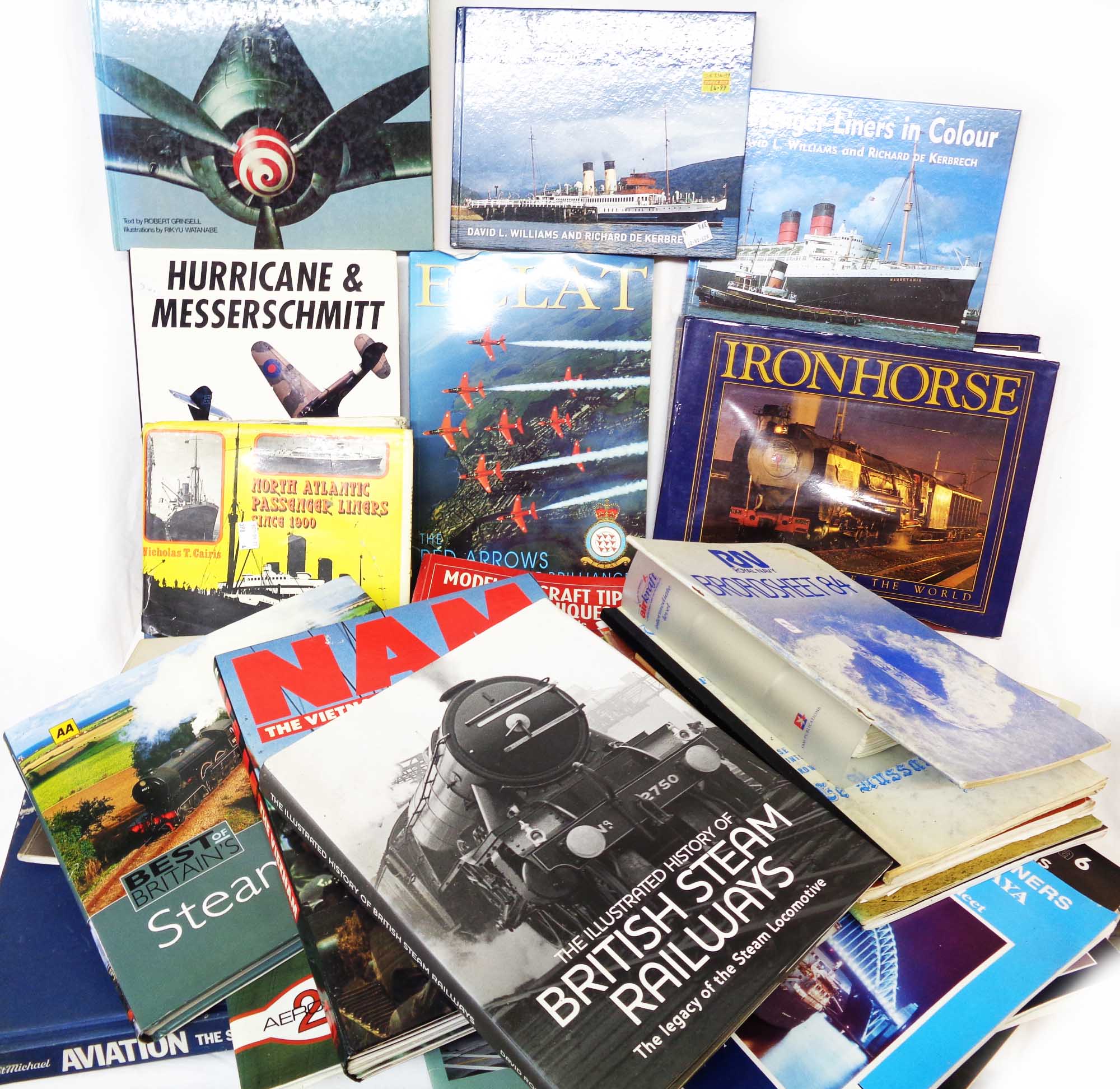 A box containing a large collection of assorted hard back and other books including aircraft,