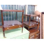 A pair of reproduction mahogany two tier bedside tables with drawer and slender turned supports