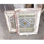 Three old window panels with stained leaded decoration