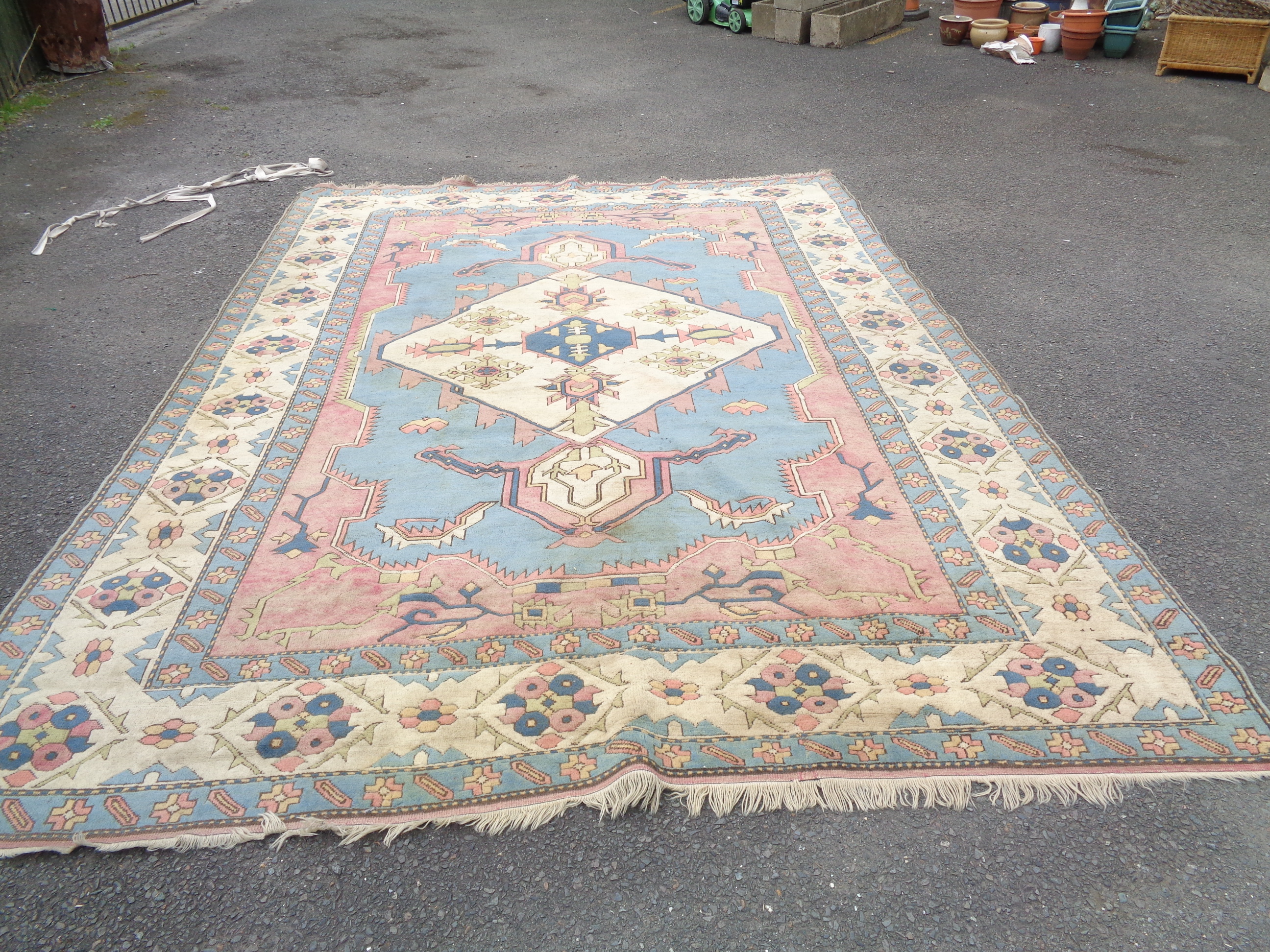 A 20th Century handmade wool rug with Herati style pattern - 3.75m X 2.6m