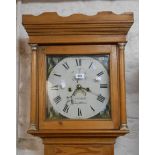 A late 18th Century pine longcase clock, the 29cm repainted square dial marked for C.P. Tickell of