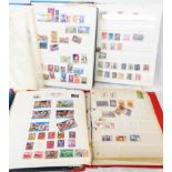 Two stock albums and two stamp albums with part contents of 20th Century GB and world stamps