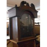 An antique stained longcase clock case