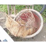 Two cast iron washing pots - sold with three wrought iron hanging baskets