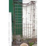 A wrought iron garden gate