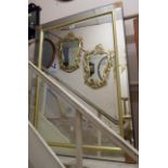 A reproduction Art Deco style bevelled oblong wall mirror with decorative mirrored border - 1.05m