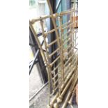 A modern brass bedstead in the antique style