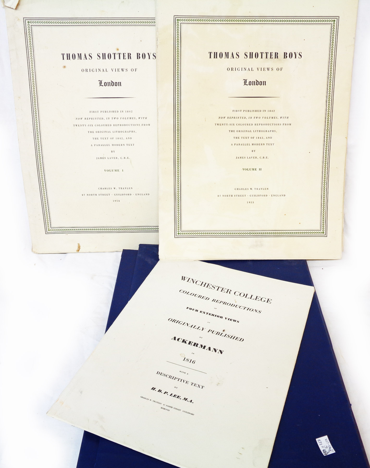 A blue folio containing Thomas Shotter Boys Original Views of London Volume I 1954 and Volume II