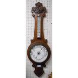 A late Victorian stained and carved oak banjo barometer/thermometer a/f