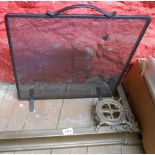 A brass fire kerb fender with decorative roundels to corners - sold with a wrought iron mesh fire