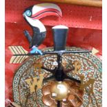 A modern cast metal weather vane with Guinness toucan motif to top