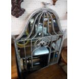 A modern decorative antiqued metal framed wall mirror with dome-top plate and wirework border - 1.2m