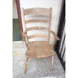A 19th Century ladder back elbow chair