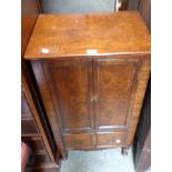 A 51cm figured walnut effect two door cabinet with partitioned drawer under - no back board