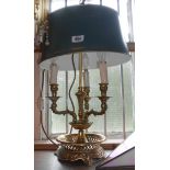 A vintage cast brass three branch table lamp with pierced gallery and toleware shade