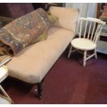 An Edwardian walnut part show frame chaise longue, set on turned legs - upholstery dirty - sold with