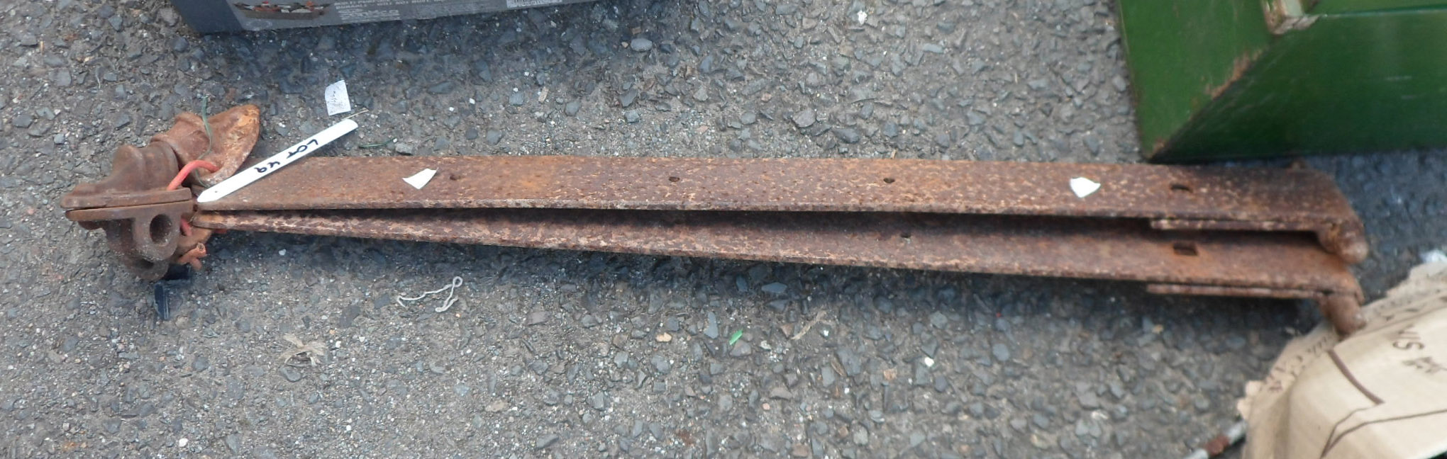 A pair of large strap hinges