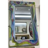 A decorative painted wood framed oblong wall mirror with heart decoration