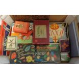 A box containing a selection of vintage games including Totopoly, Taxi, Happy Birds, Snap, etc.