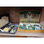 A vintage oak canteen containing a quantity of silver plated cutlery - sold with another case of