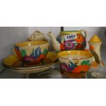 A small selection of Clarice Cliff Bizarre pottery items in the Gayday and Crocus patterns - various