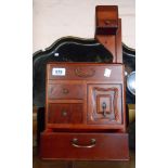 A vintage Japanese wooden sewing box with removal pin cushion and ruler holder and metal handles