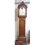 An early 19th Century oak longcase clock, the 29cm silvered arch dial with rocking galleon action,