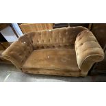 A 1.4m early 20th Century single drop-end Chesterfield settee with button back upholstery, set on