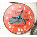 A reproduction T. T. Races tin wall timepiece with battery movement