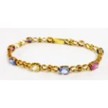 A marked 18k fancy-link bracelet, set with different coloured sapphires