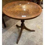 A 50cm diameter Bevan Funnell Reprodux pedestal table set on turned pillar and tripod base